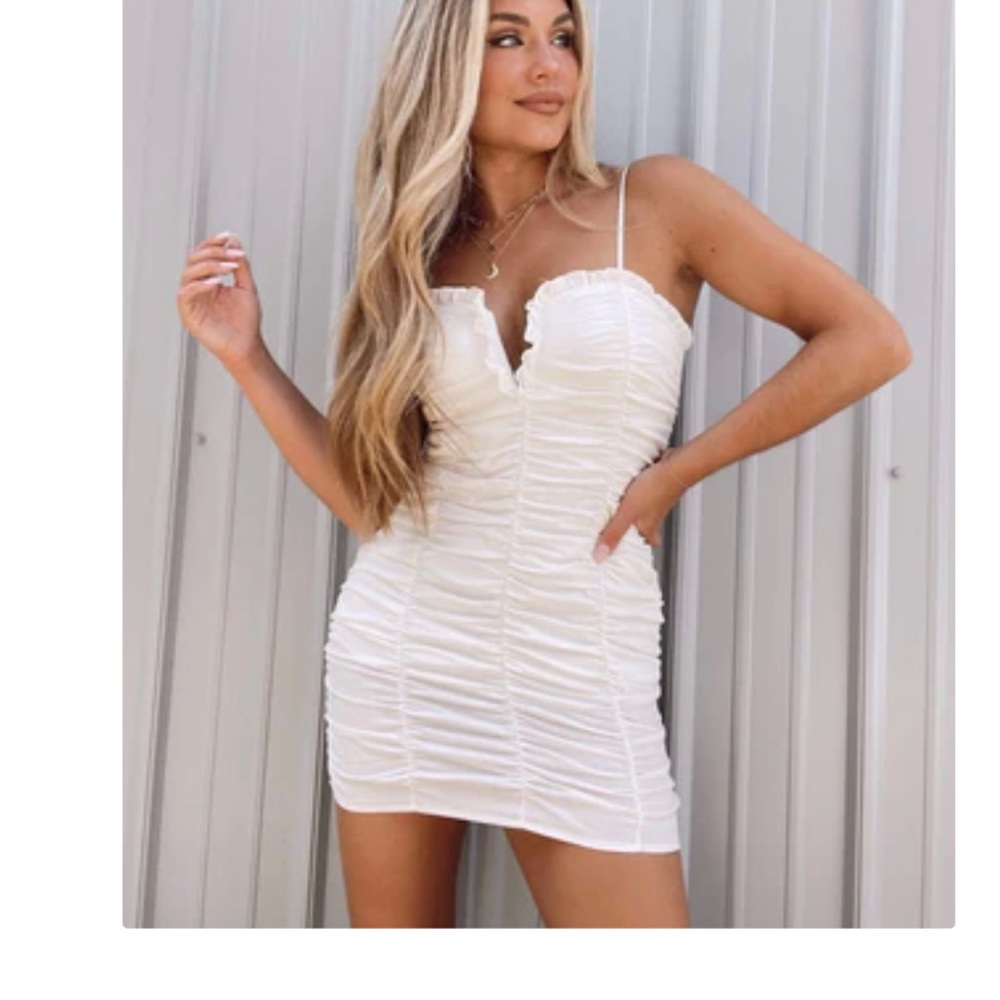 Size L white mini dress. Never worn